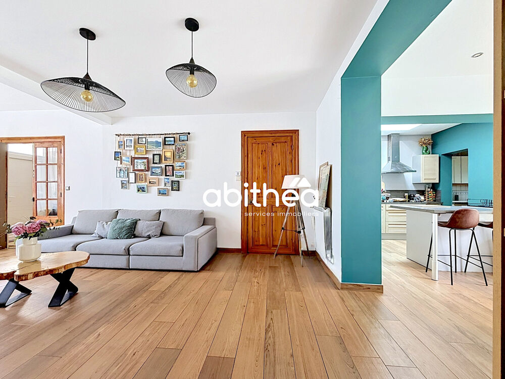 Maison familiale avec beaux volumes et jardin