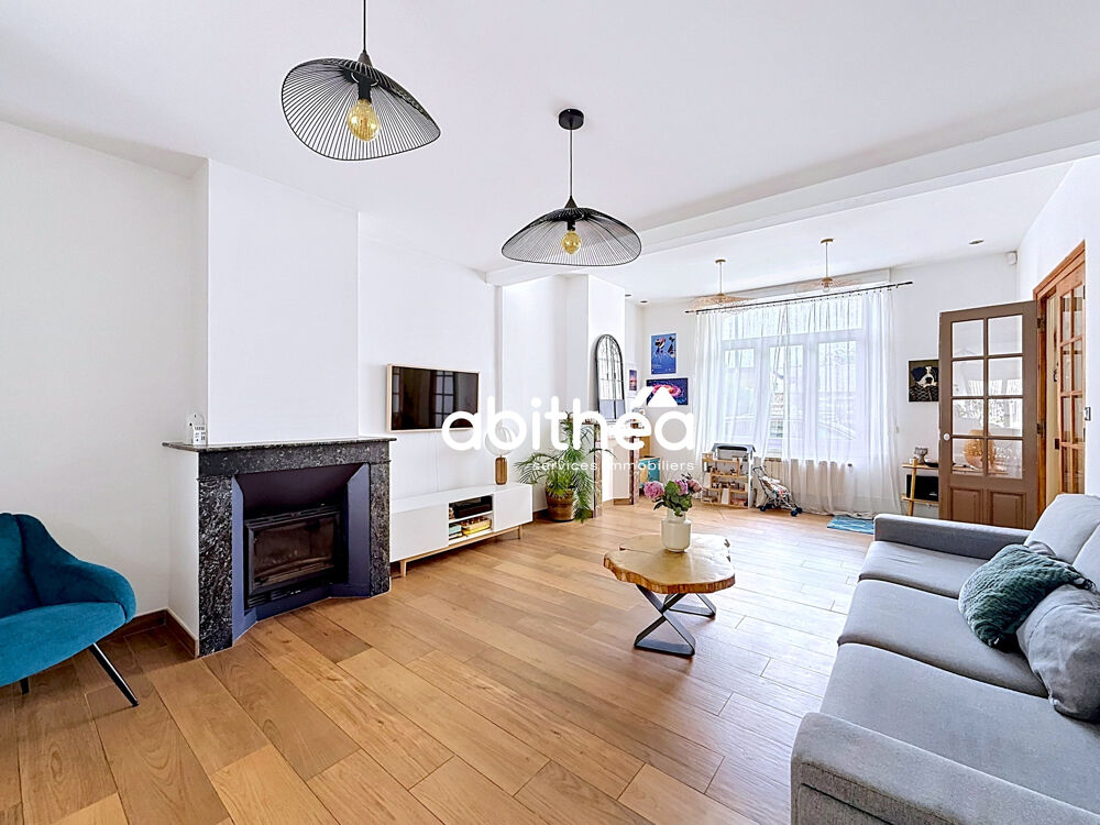 Maison familiale avec beaux volumes et jardin