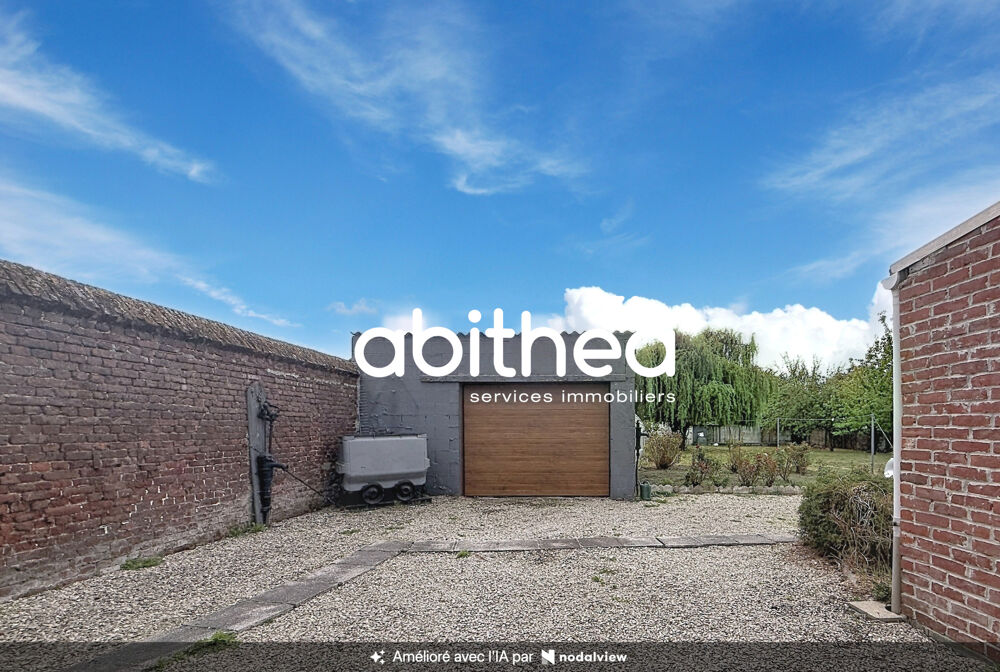 PLAIN PIED DE 70M2 EN CENTRE VILLE AVEC GARAGE ET JARDIN