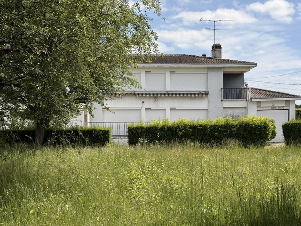 Ensemble immobilier avec habitation et local commercial