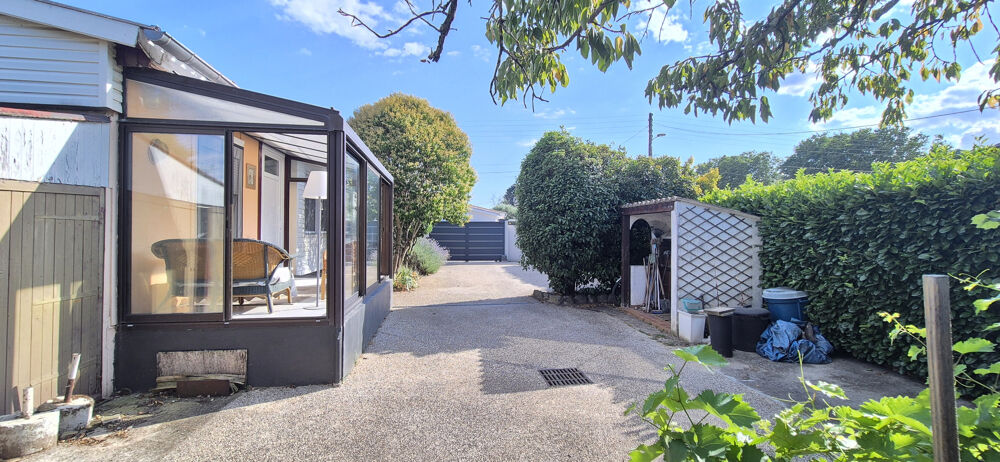 Maison individuelle de plain-pied, garage et terrain clos de 547 m2