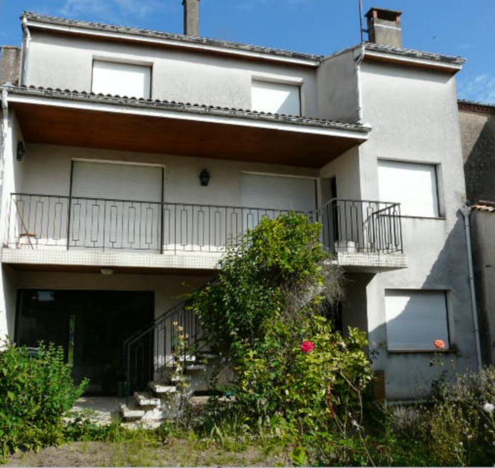 Coeur de ville, grande maison jardin garages
