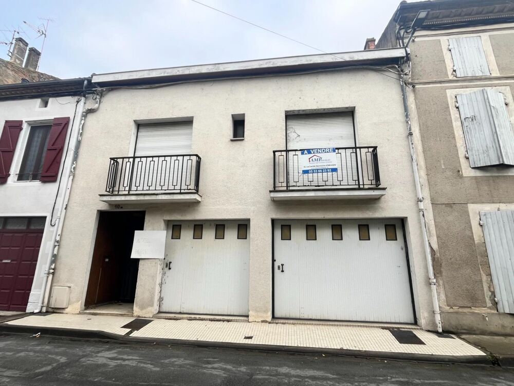 Coeur de ville, grande maison jardin garages