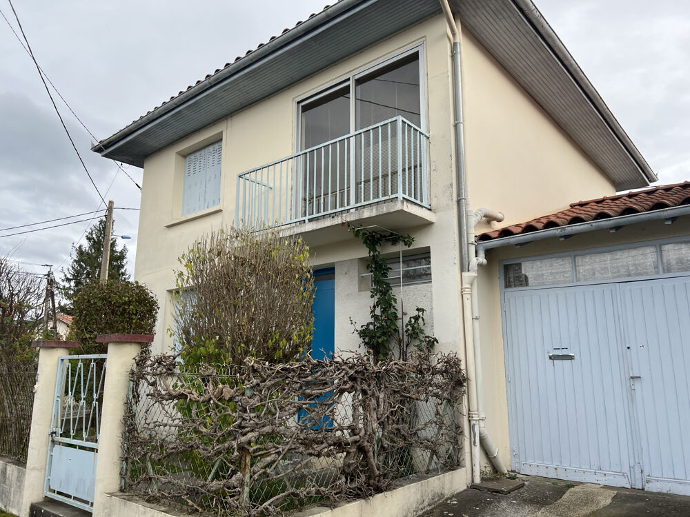 MAISON DE VILLE A REDÉCORER AVEC JARDIN CLOS ET GARAGE