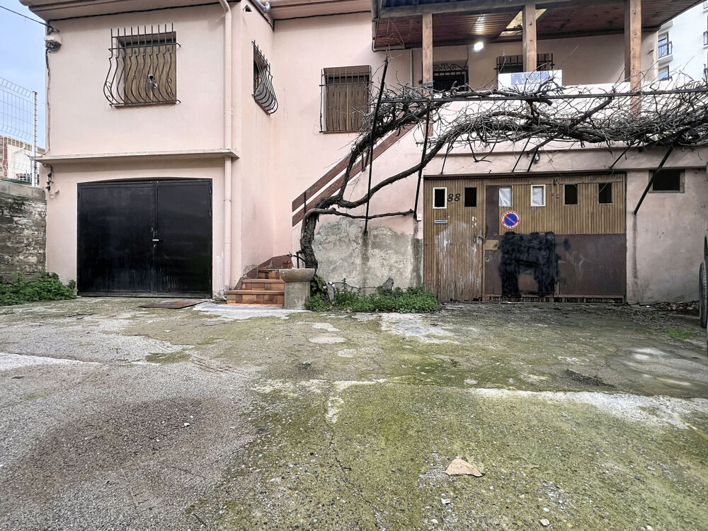 MAISON DE VILLE 95 M2 HBTS SUR 169 M2 DE TERRAIN - 2 GARAGES 59 M2 -TERRASSE -COUR INTERIEURE