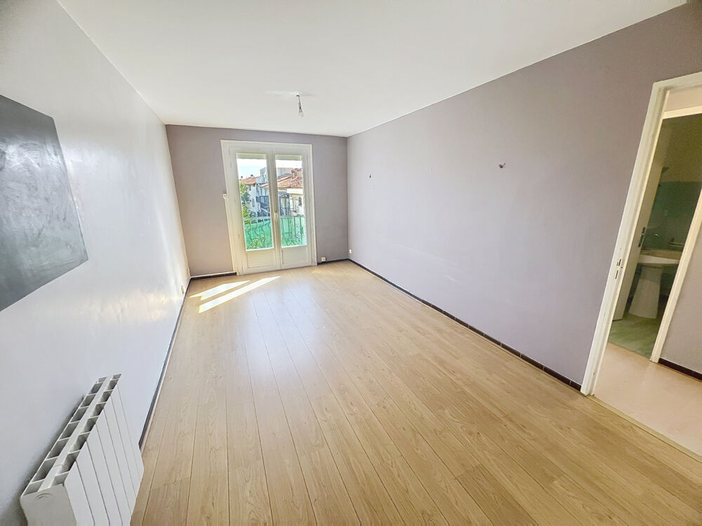 APPARTEMENT DE TYPE 2 - CAVE ET BALCON