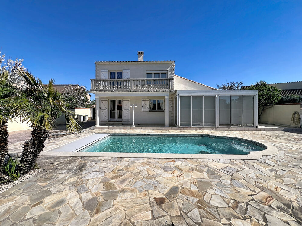 SECTEUR RESIDENTIEL - VILLA 4 FACES 180 M2 HBTS SUR 858 M2 DE TERRAIN -2 GARAGES -PISCINE