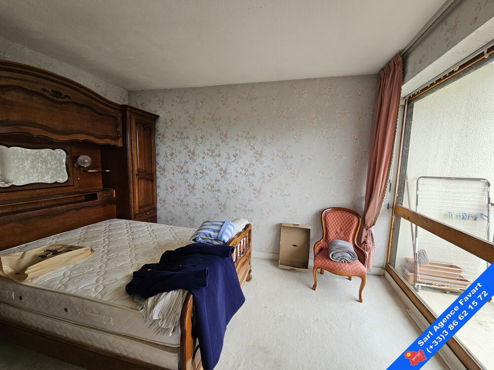 APPARTEMENT EN RÉSIDENCE AVEC ESPACES VERTS ET GARAGE FERME