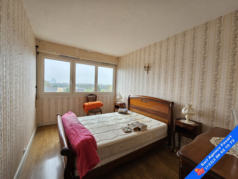APPARTEMENT EN RÉSIDENCE AVEC ESPACES VERTS ET GARAGE FERME
