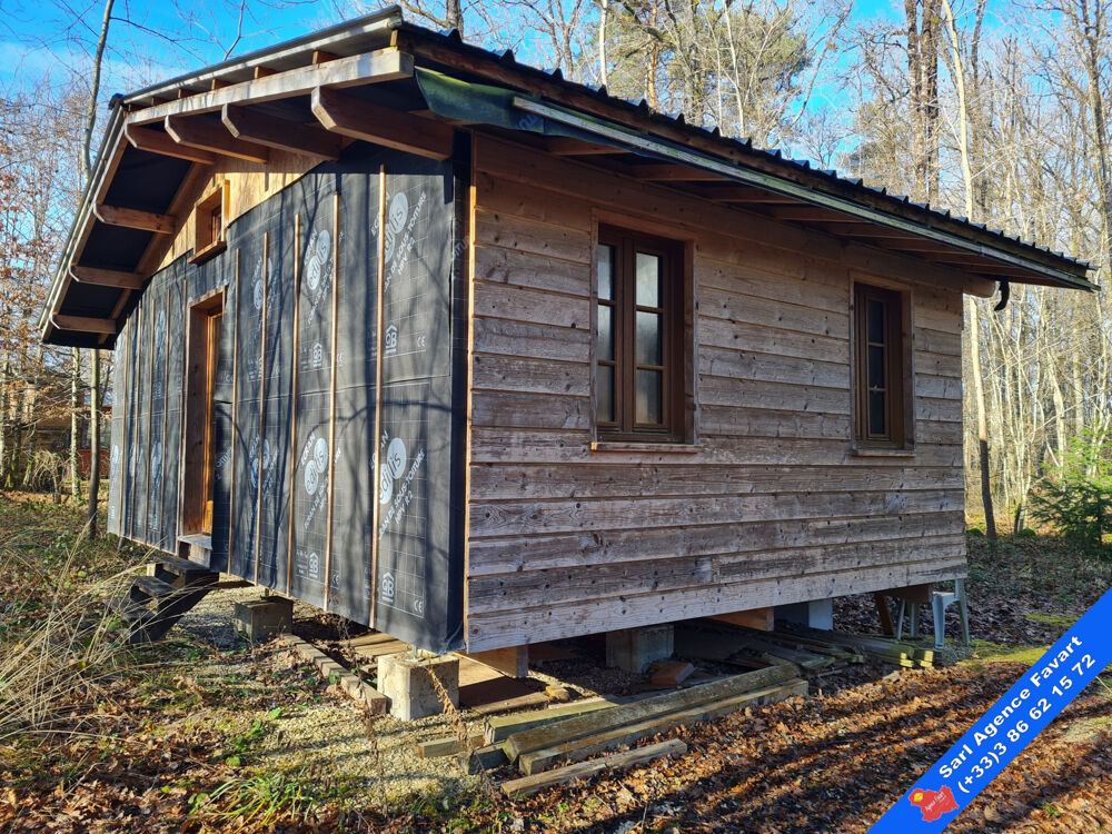 Chalet en bois à finir daménager Environnement calme et boisé