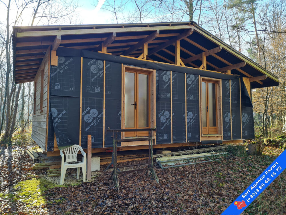 Chalet en bois à finir daménager Environnement calme et boisé