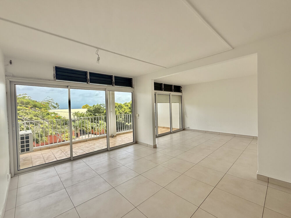APPARTEMENT T3 DE 95 M2 ENVIRON AVEC TERRASSE, GARAGE FERMÉ, PISCINE, CITERNE ET TENNIS - L'HOUEZEL