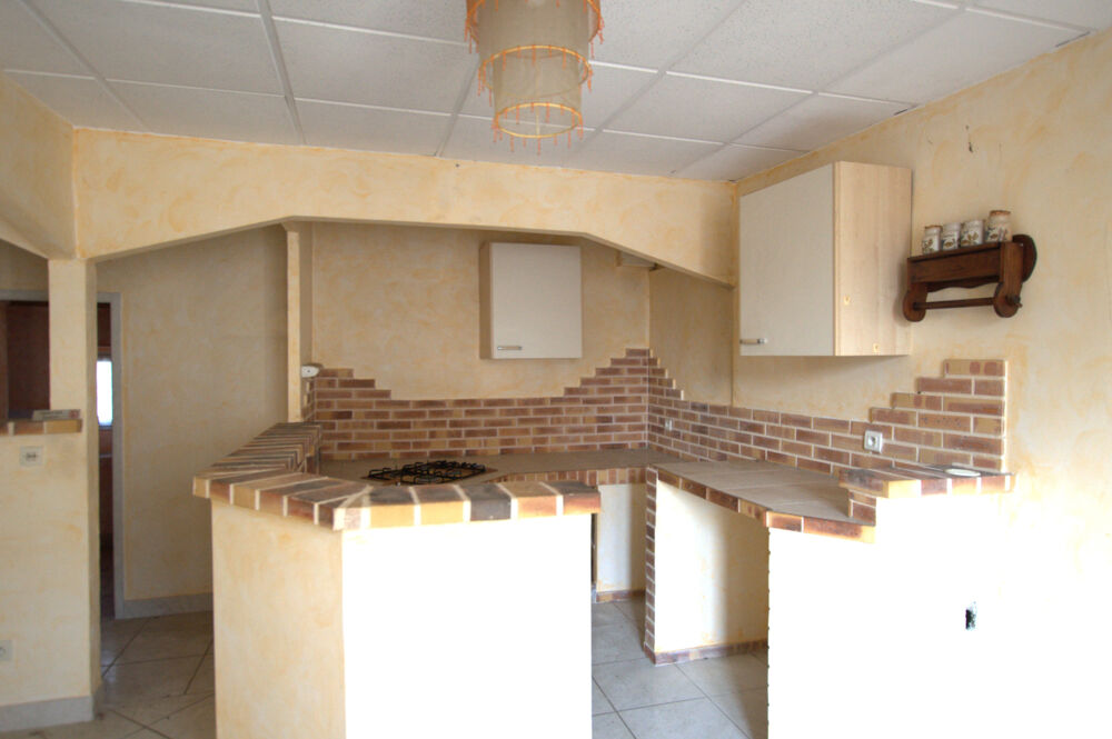 Maison à rénover composé de 4 appartements et des combles aménageables