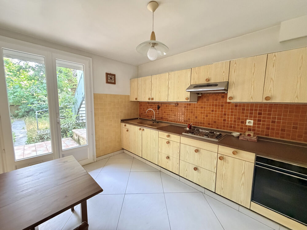 Maison 5 pièces de 109 m2 avec jardin et garage