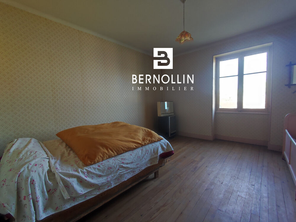 Maison de village à rénover de 137 m2 avec garage et terrain Beau potentiel à Pressiat