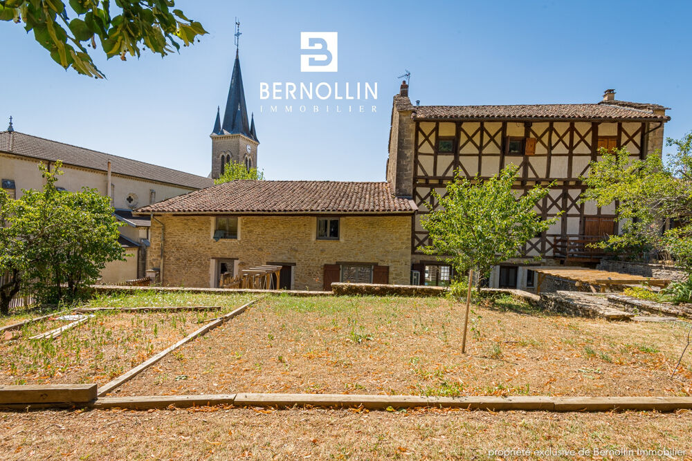 Vente Maison Demeure à colombage en pierre entièrement rénovée de 248 m2 en plein centre de Cuisiat Val revermont