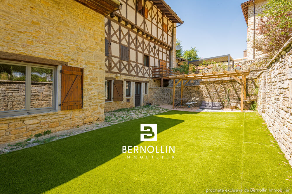 Vente Maison Demeure à colombage en pierre entièrement rénovée de 248 m2 en plein centre de Cuisiat Val revermont