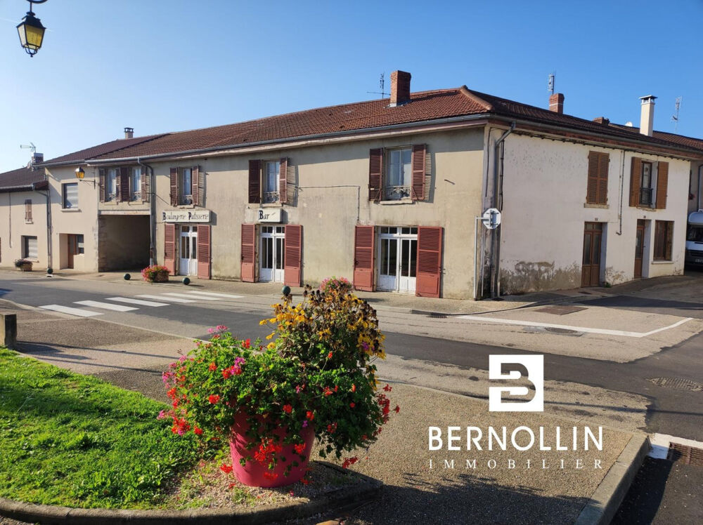 Ensemble immobilier au c?ur de Beaupont avec terrain et location de locaux