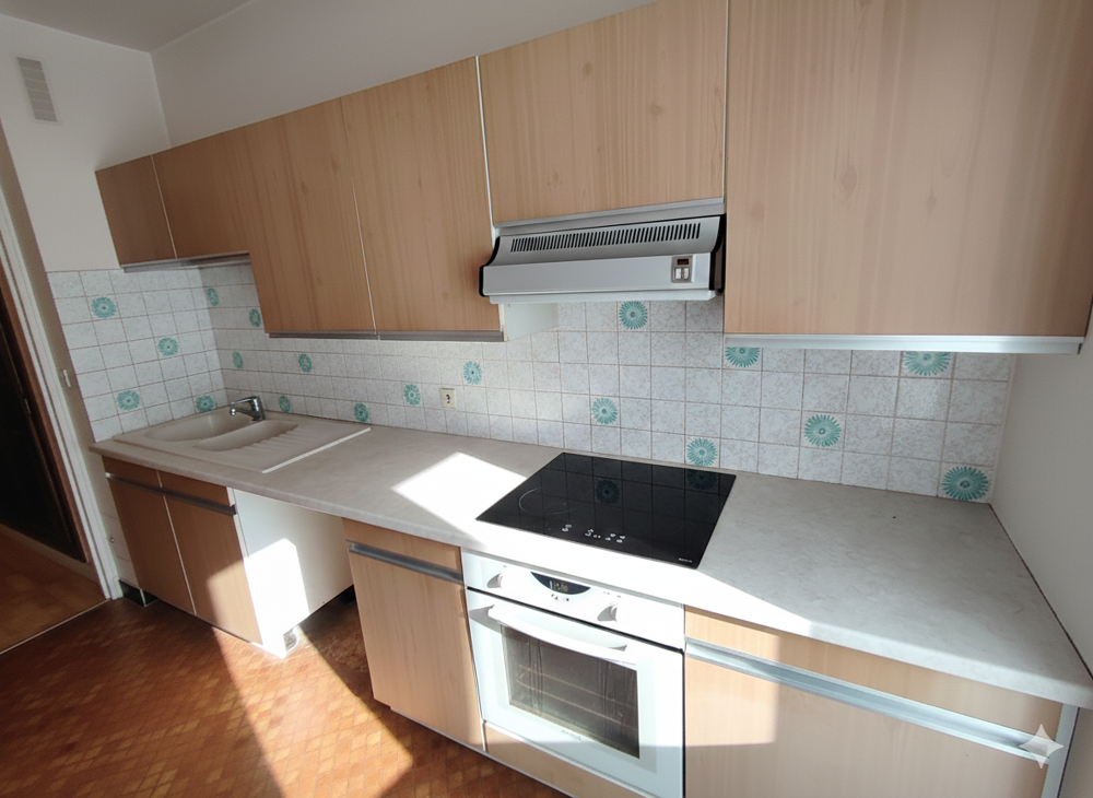 APPARTEMENT TYPE 2 EN CENTRE VILLE AVEC CAVE ET PLACE DE PARKING PRIVATIVE