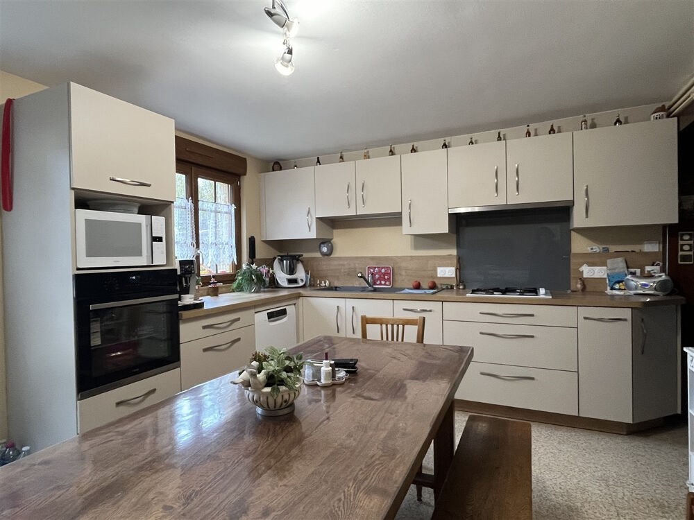 Vente Maison Au cœur d'un charmant village typique de Normandie, découvrez cette belle propriété en briques à l'ambiance fa Vimoutiers