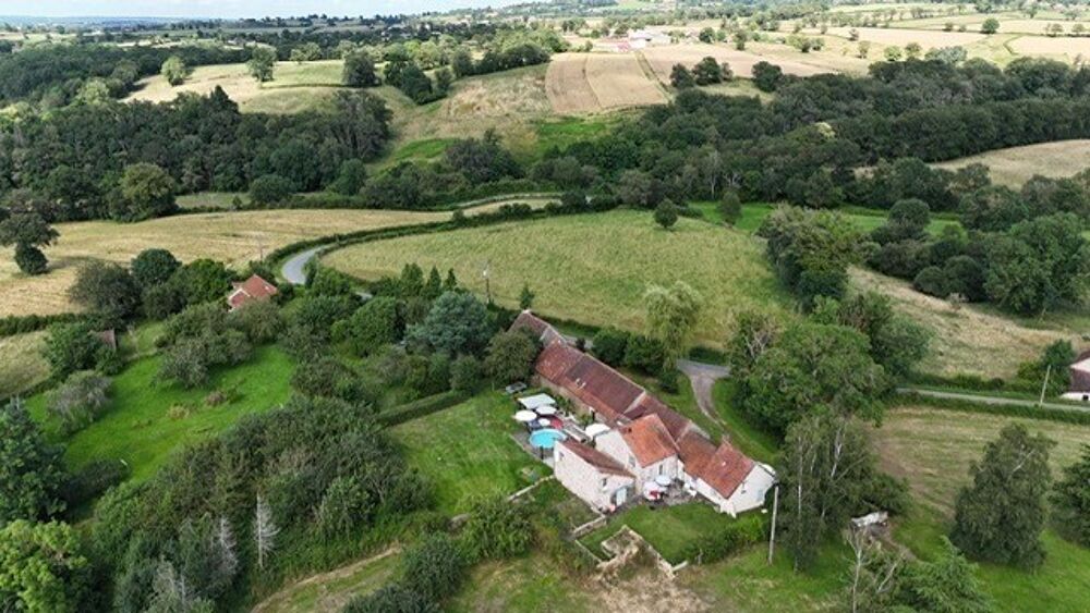 Vente Maison Centre de village caractéristique avec 7 bâtiments à la campagne Moureuille