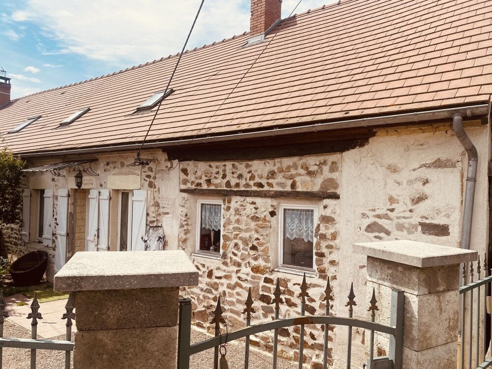 Maison mitoyenne spacieuze avec jardin