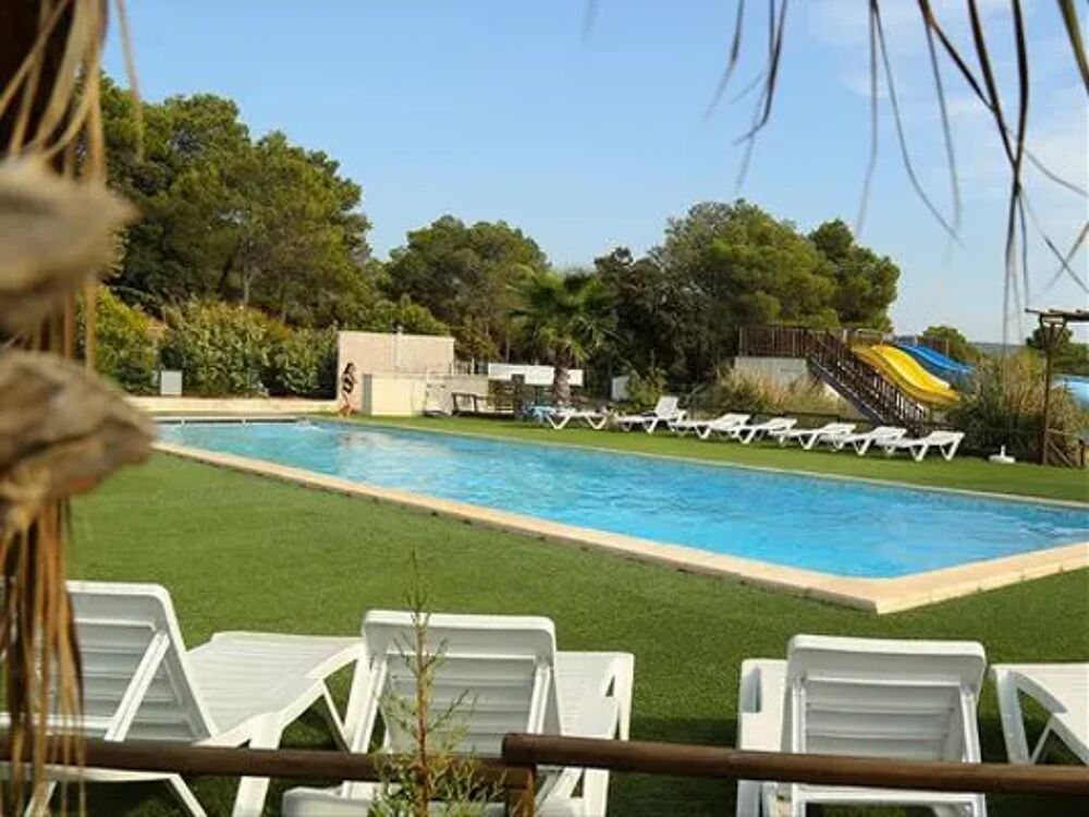   Camping Le Pinada - MAGNOLIA Piscine collective - Terrasse - place de parking en extrieur - Salon jardin - Transats Languedoc-Roussillon, Fabrezan (11200)