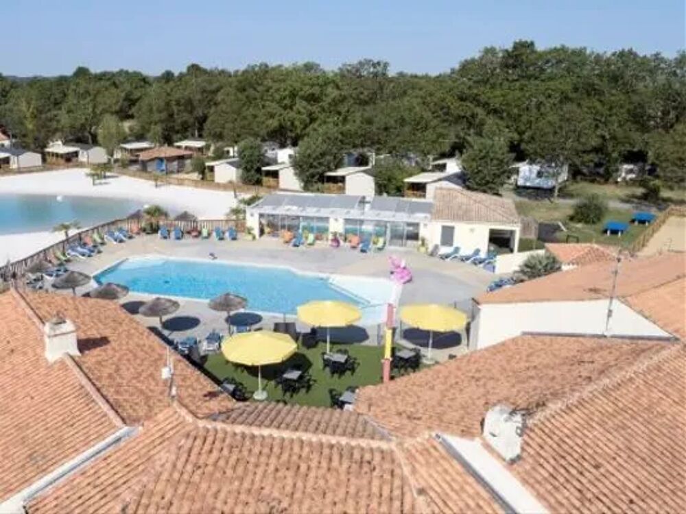   Camping Le Bois Joli - Bahia 4 Pices 6/8 Personnes + TV Piscine couverte - Piscine collective - Terrasse - Lave vaisselle - Acc Pays de la Loire, Bois-de-Cn (85710)