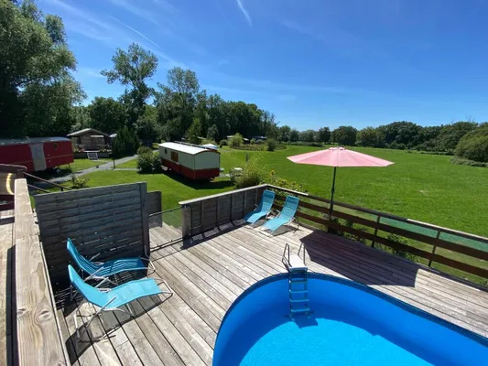   Superbe bungalow pour 4 pers. avec piscine partage  Saint-Pardoux Piscine collective - Terrasse - place de parking en extrieu Auvergne, Saint-Pardoux (63440)