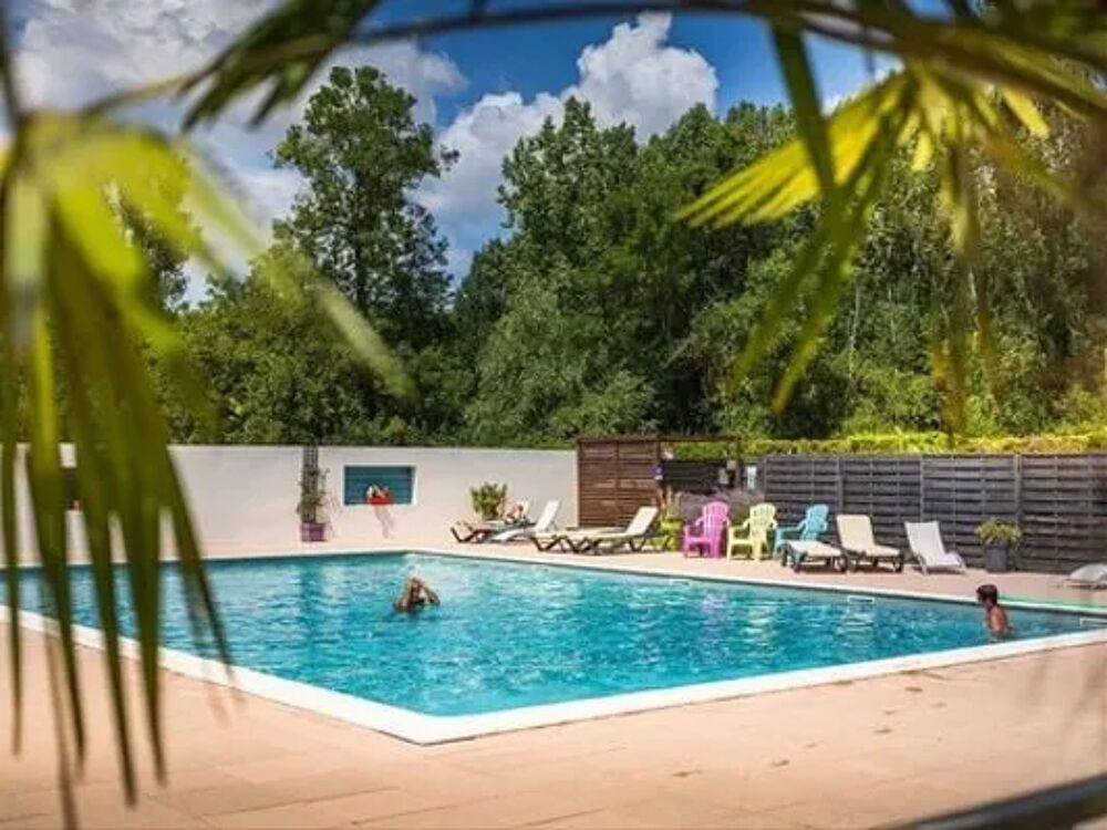   Camping Le Soleil des Bastides - CABATENTE Piscine collective - Terrasse - place de parking en extrieur - Accs Internet - Barb Midi-Pyrnes, Cahuzac-sur-Vre (81140)