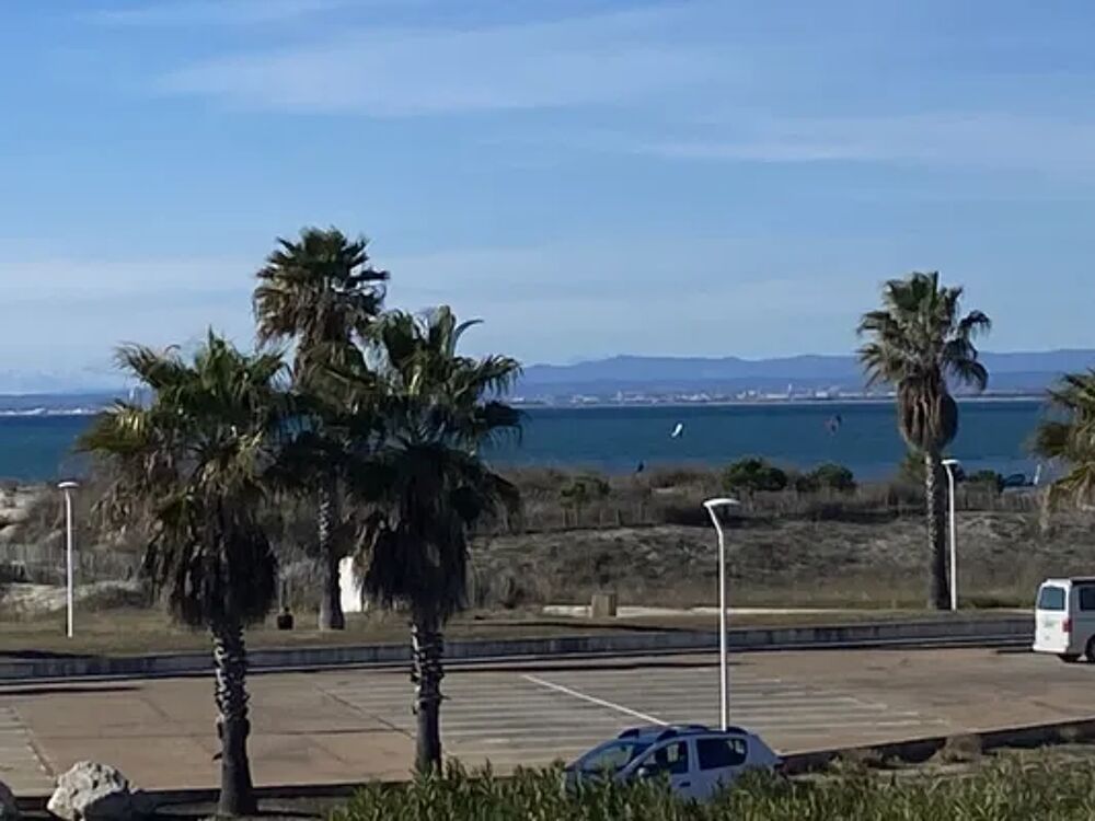   Sol-y-Days Ulysse Port Plage Appartement marina vue mer a Port Camargue Tlvision - Terrasse - place de parking en extrieur - Languedoc-Roussillon, Le Grau-du-Roi (30240)