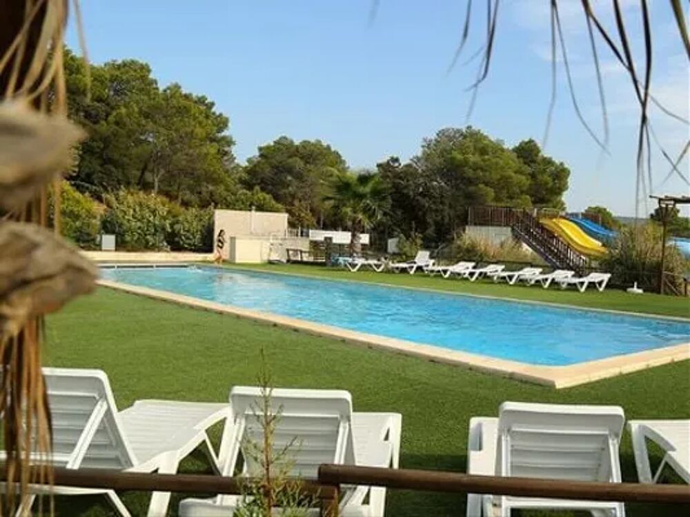   Camping Le Pinada - TRITON - 2 chambres - Essentiel - 24m Piscine collective - Terrasse - place de parking en extrieur - Salon Languedoc-Roussillon, Fabrezan (11200)