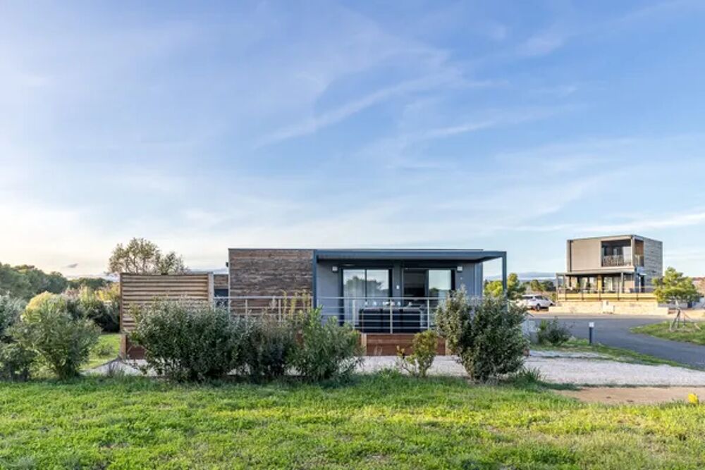   Maison pour 6 pers. avec piscine partage, jardin et terrasse  Homps Piscine collective - Tlvision - Terrasse - Vue lac - pla Languedoc-Roussillon, Homps (11200)