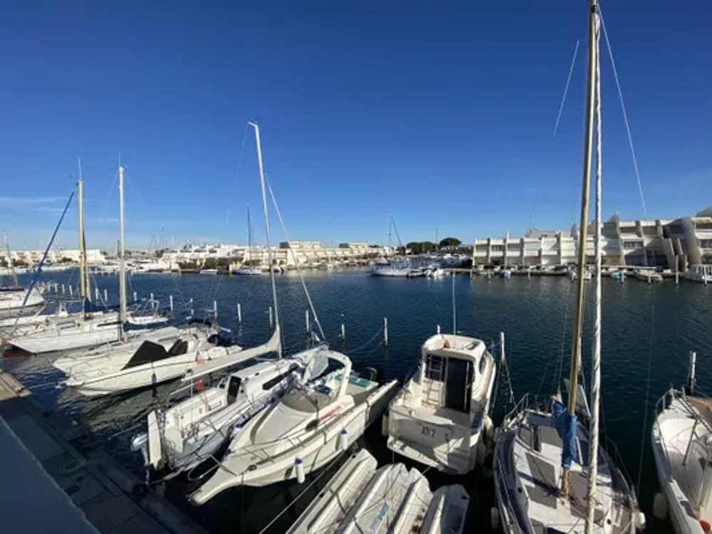   Sol-y-Days Ulysse Port Plage Appartement marina vue mer a Port Camargue Tlvision - Terrasse - place de parking en extrieur - Languedoc-Roussillon, Le Grau-du-Roi (30240)