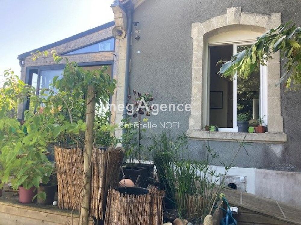 Maison sur sous sol,entouré de verdure,terrain constructible