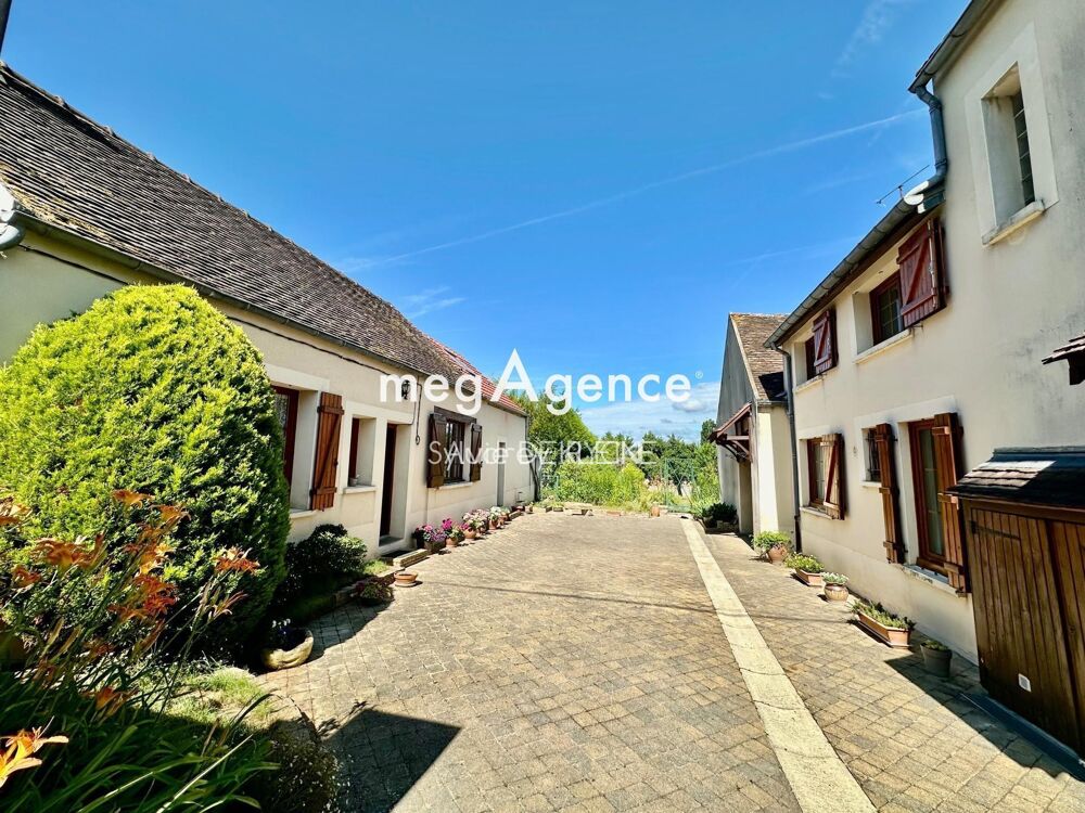 Ensemble de deux maisons avec jardin de 565m2