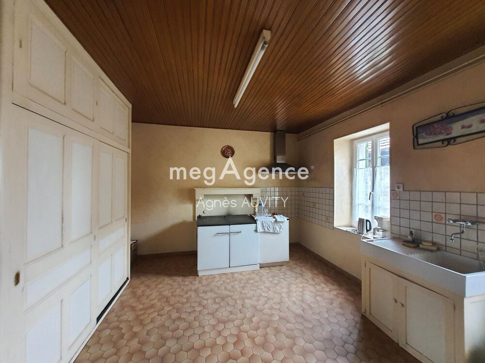 Maison de caractère avec grange en pierres.