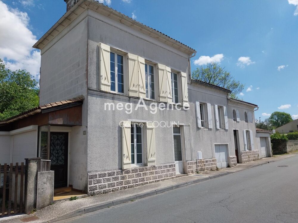A vendre 2 maisons mitoyennes+ garage + terrain 3 310 m²  Jonzac centre
