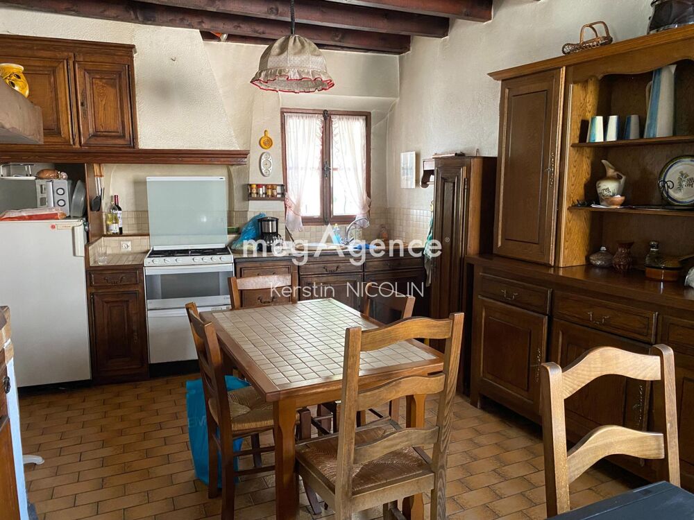 Maison de village, garage, caves et beau potentiel