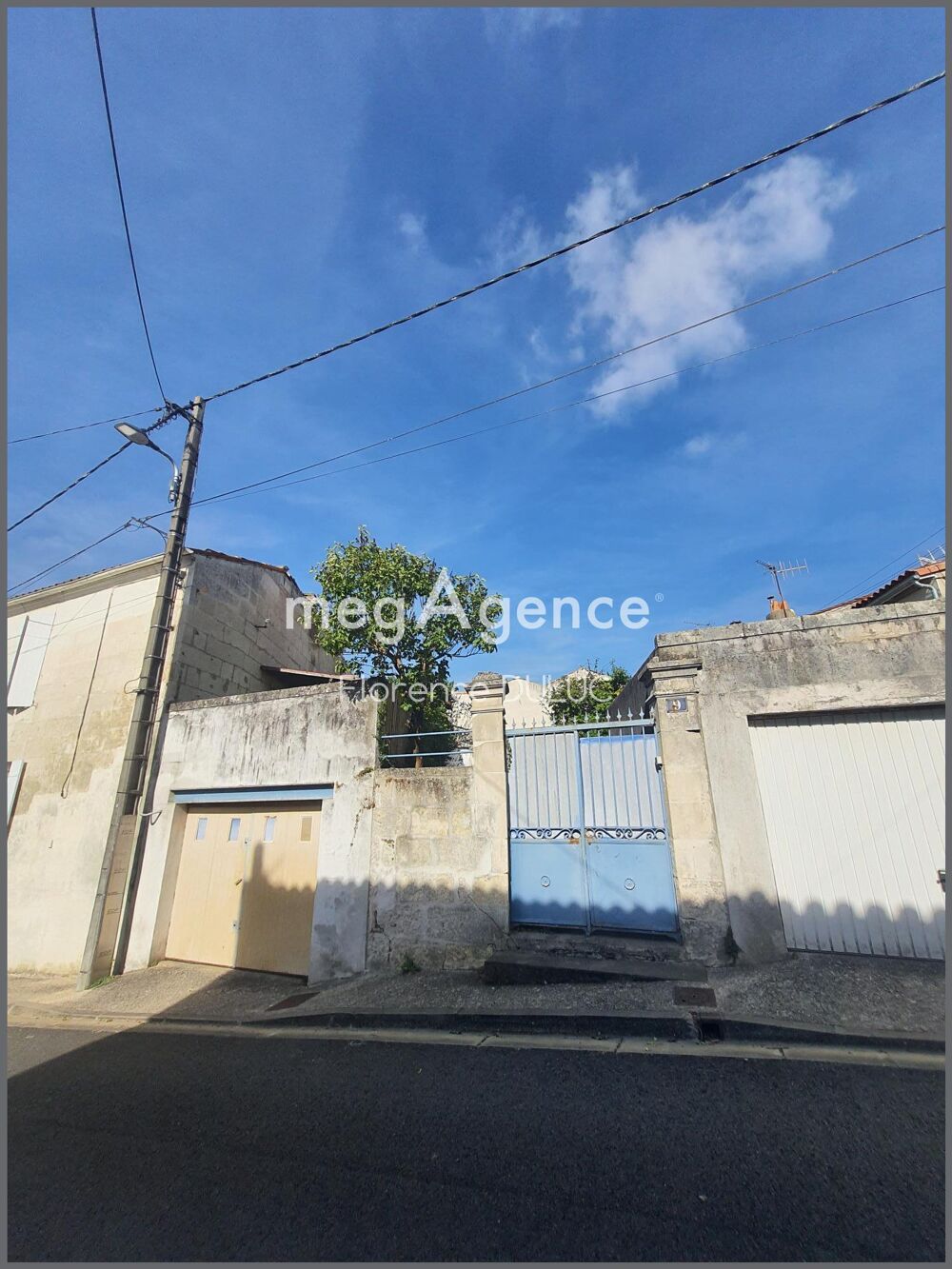 MAISON DE VILLE AVEC GARAGE ET JARDIN