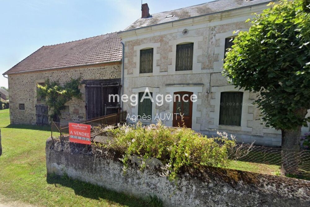 Maison de caractère avec grange en pierres.