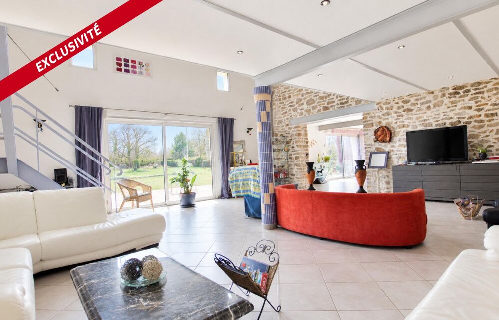 MAISON ATYPIQUE SUR UN TERRAIN DE 2 Ha 19a 33ca