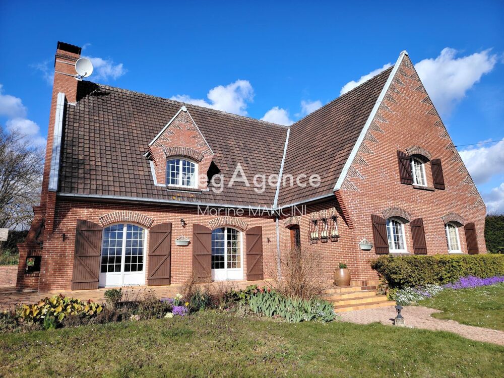 Maison familiale spacieuse avec beau jardin