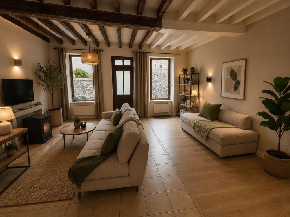 Maison de plain pied avec jardin.