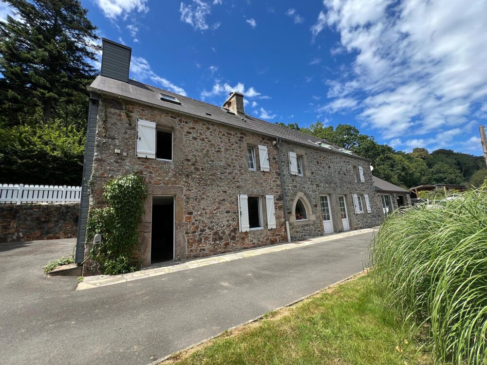 Maison en pierre dans un écrin de nature avec étang et forêt