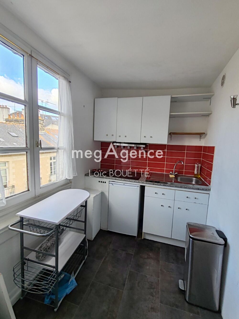 Appartement lumineux au dernier étage  Emplacement central