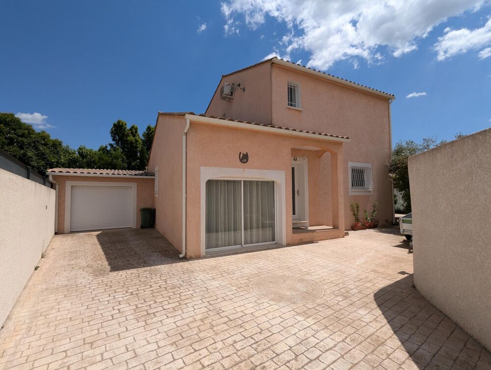 Maison familiale 5 pièces de 125 m² à REDESSAN  DPE A/A Terrain 643 m² avec piscine