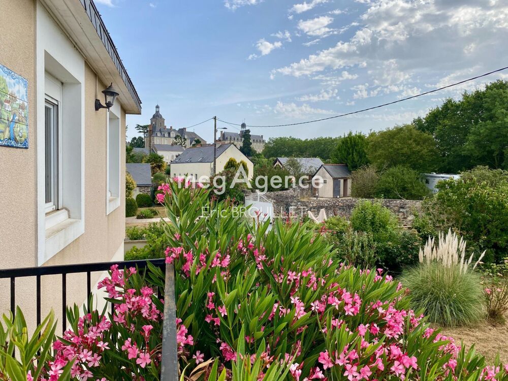Deux niveaux de vie et jardin en centre-bourg