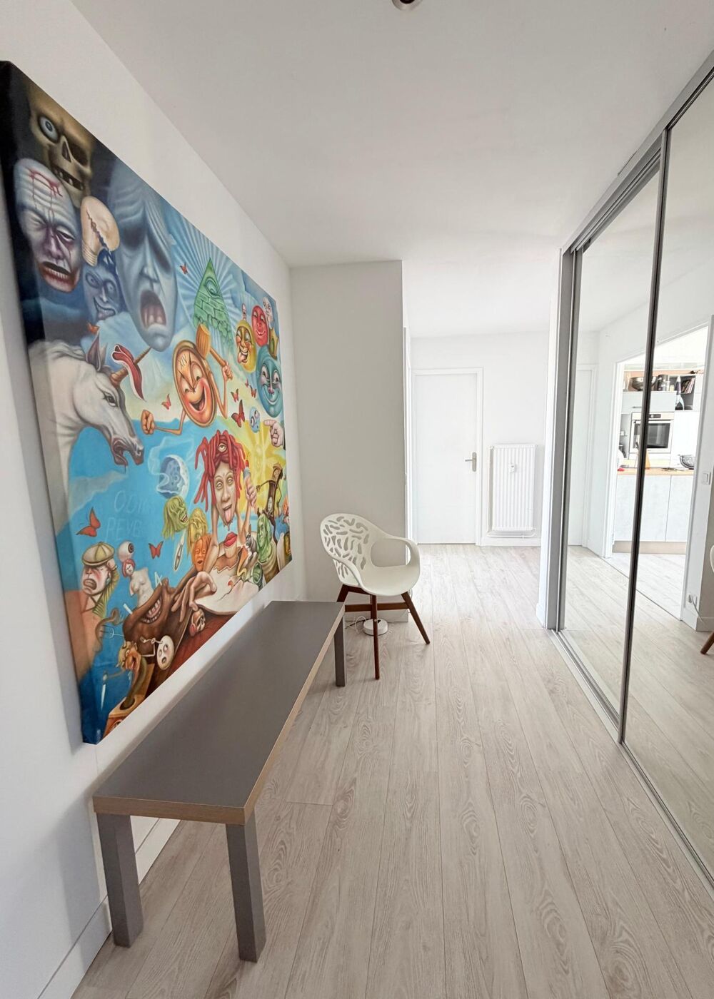 Appartement 3 chambres avec vue dégagée, cave et garage.