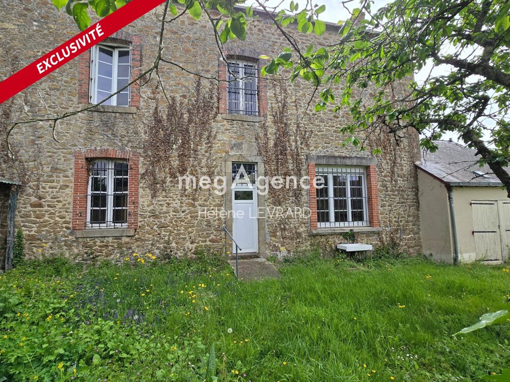 Maison de caractère avec jardin clos et double garage